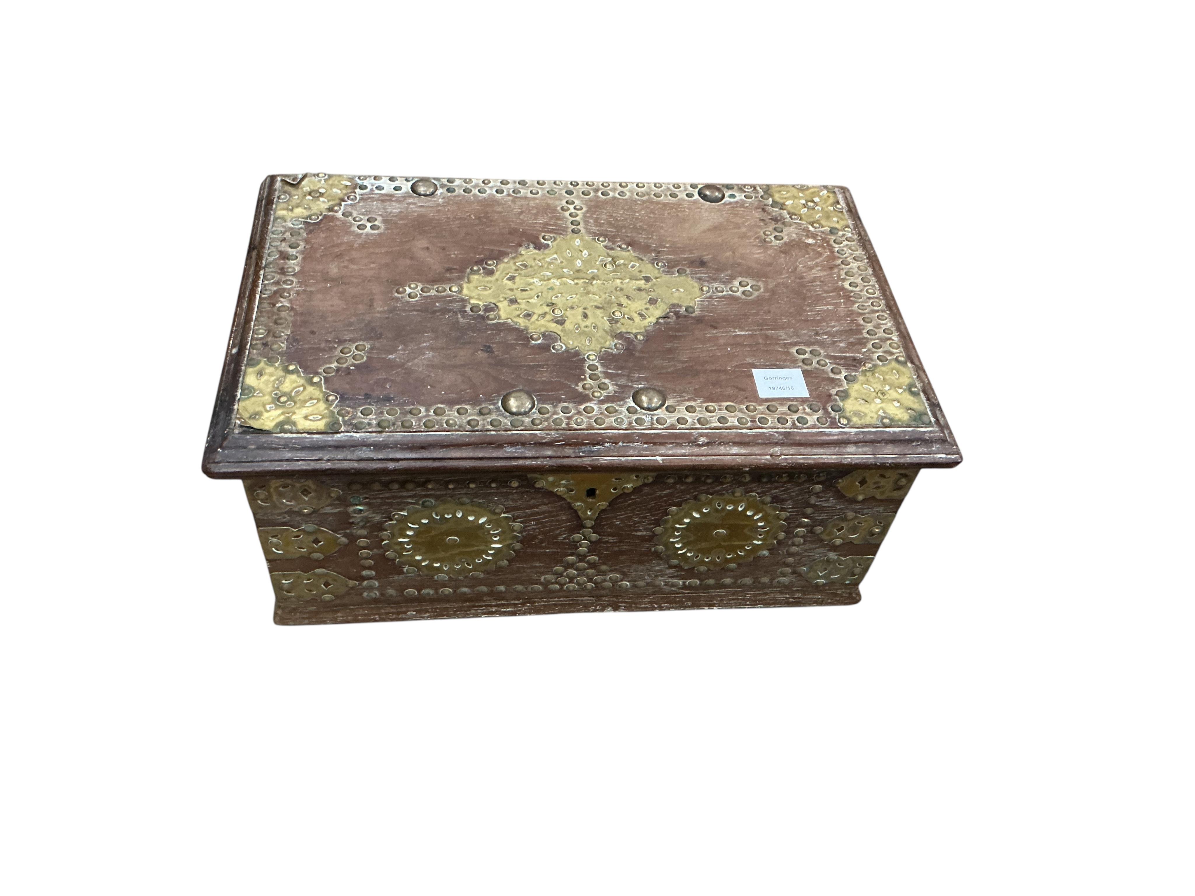 A Zanzibar type hardwood and brass studded box, width 57cm, depth 36cm, height 25cm